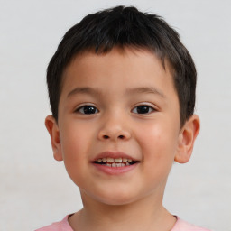 Joyful white child male with short  brown hair and brown eyes