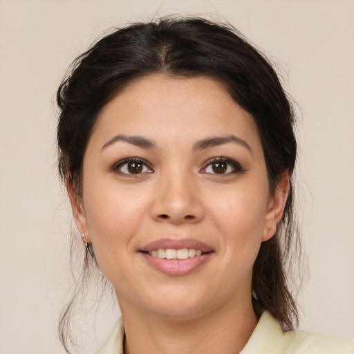 Joyful white young-adult female with medium  brown hair and brown eyes