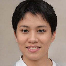 Joyful asian young-adult female with short  brown hair and brown eyes