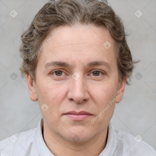 Joyful white adult female with short  brown hair and grey eyes