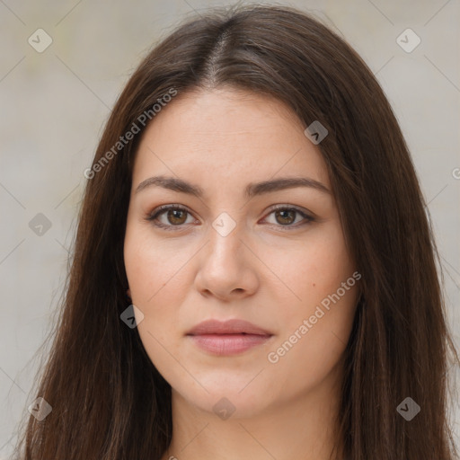 Neutral white young-adult female with long  brown hair and brown eyes