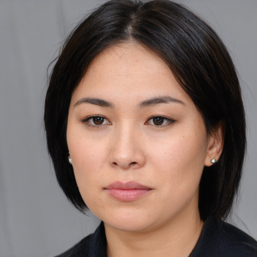 Neutral asian young-adult female with medium  black hair and brown eyes