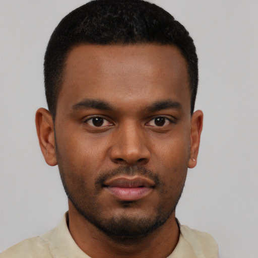 Neutral black young-adult male with short  black hair and brown eyes