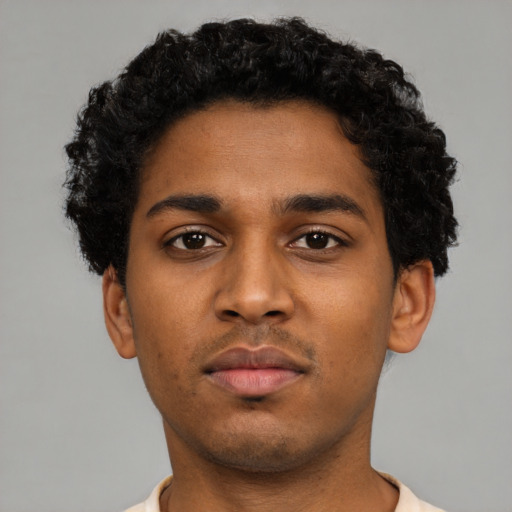 Neutral black young-adult male with short  black hair and brown eyes