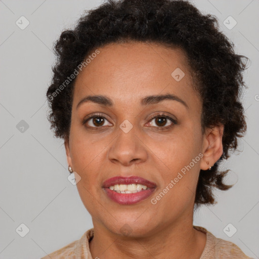 Joyful black young-adult female with short  brown hair and brown eyes