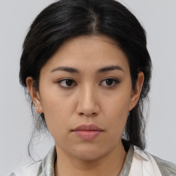 Neutral asian young-adult female with medium  black hair and brown eyes