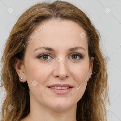 Joyful white young-adult female with long  brown hair and green eyes