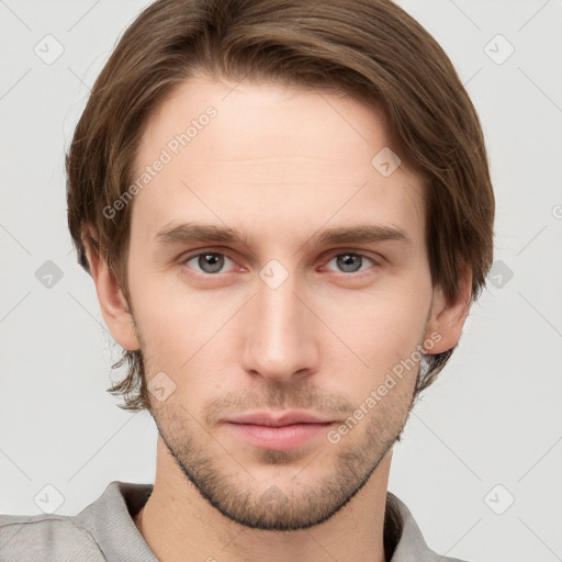 Neutral white young-adult male with short  brown hair and grey eyes