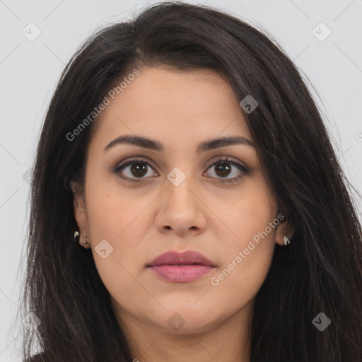 Joyful latino young-adult female with long  brown hair and brown eyes