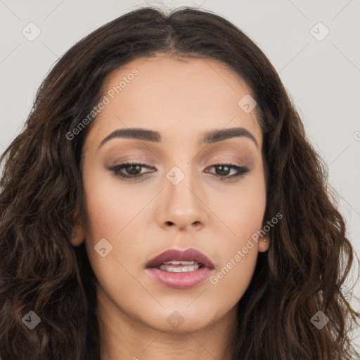 Joyful asian young-adult female with long  brown hair and brown eyes