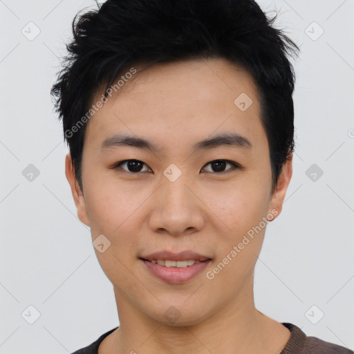 Joyful asian young-adult male with short  black hair and brown eyes