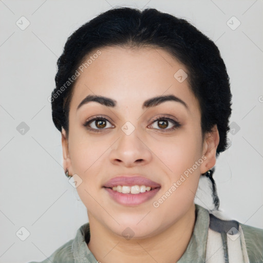 Joyful latino young-adult female with medium  black hair and brown eyes