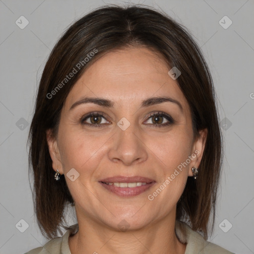 Joyful white adult female with medium  brown hair and brown eyes