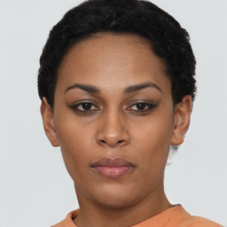 Neutral black young-adult female with short  black hair and brown eyes