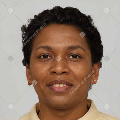 Joyful black adult female with short  brown hair and brown eyes