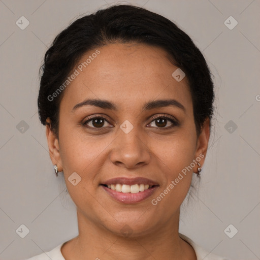 Joyful latino young-adult female with short  brown hair and brown eyes