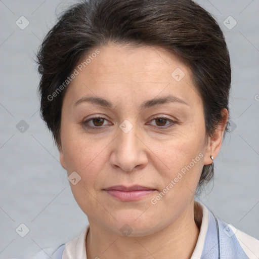 Joyful white adult female with short  brown hair and brown eyes