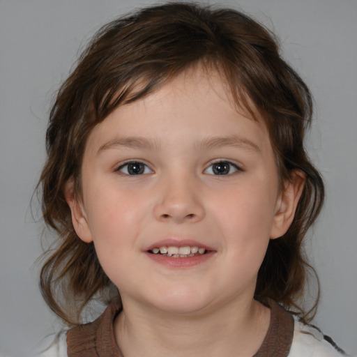 Joyful white child female with medium  brown hair and brown eyes