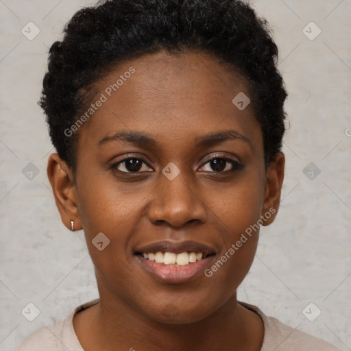 Joyful black young-adult female with short  brown hair and brown eyes