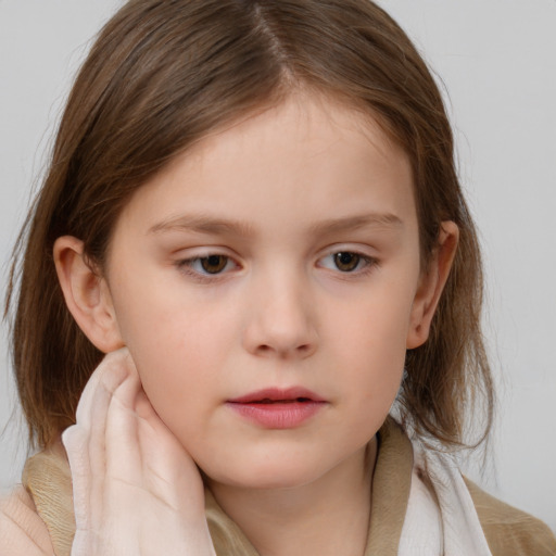 Neutral white child female with medium  brown hair and brown eyes