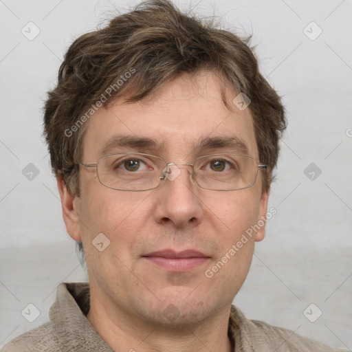 Joyful white adult male with short  brown hair and grey eyes