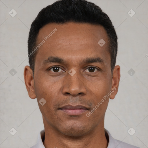 Neutral black young-adult male with short  black hair and brown eyes