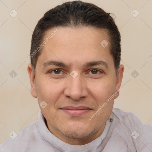 Joyful white adult male with short  brown hair and brown eyes