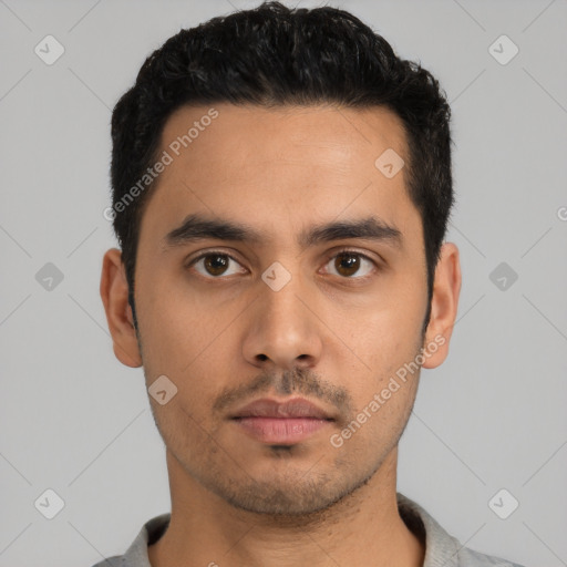 Neutral latino young-adult male with short  black hair and brown eyes