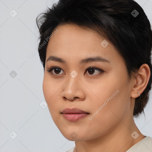 Neutral asian young-adult female with medium  brown hair and brown eyes