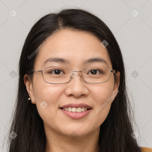 Joyful white adult female with long  brown hair and brown eyes