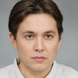 Neutral white adult male with short  brown hair and brown eyes