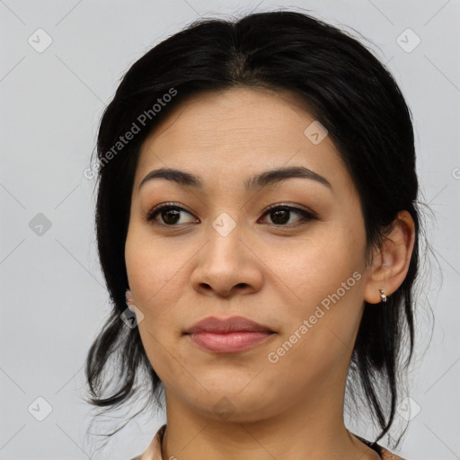 Joyful asian young-adult female with medium  black hair and brown eyes