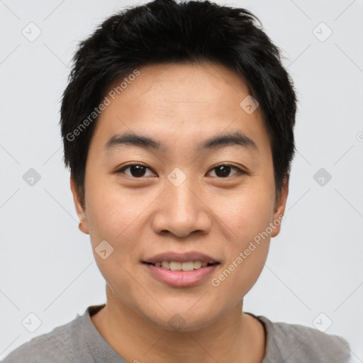 Joyful asian young-adult male with short  brown hair and brown eyes