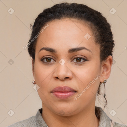 Joyful latino young-adult female with short  brown hair and brown eyes