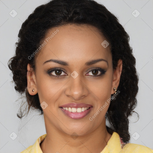 Joyful black young-adult female with long  brown hair and brown eyes