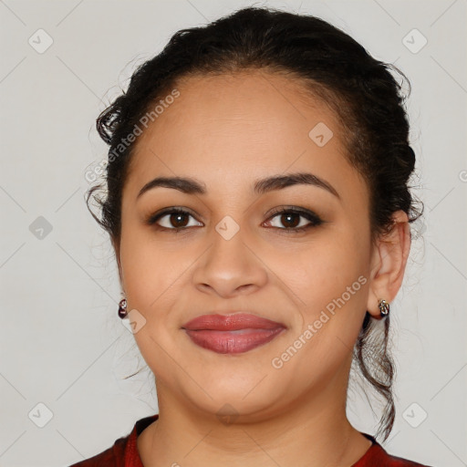 Joyful latino young-adult female with medium  brown hair and brown eyes