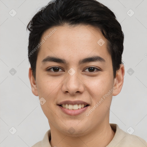 Joyful asian young-adult male with short  brown hair and brown eyes