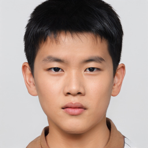 Neutral asian child male with short  brown hair and brown eyes