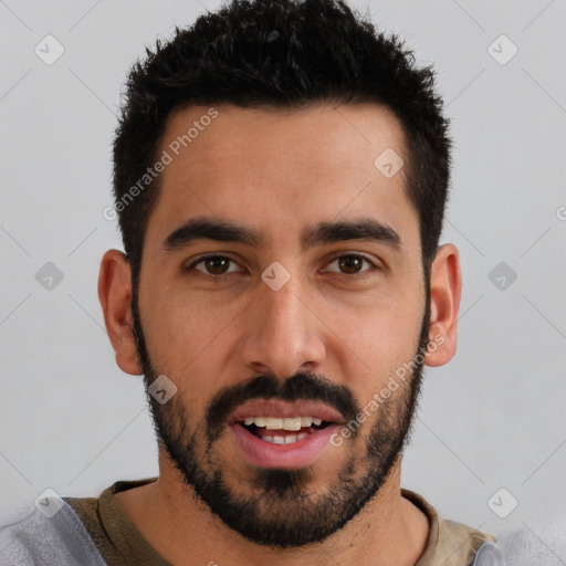 Joyful latino young-adult male with short  black hair and brown eyes