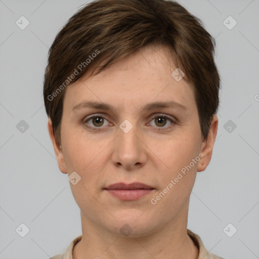 Joyful white young-adult female with short  brown hair and grey eyes