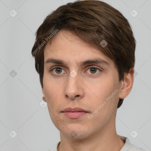 Neutral white young-adult male with short  brown hair and grey eyes