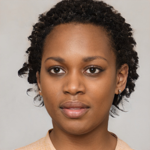 Neutral black young-adult female with short  black hair and brown eyes