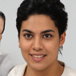 Joyful asian young-adult female with short  brown hair and brown eyes