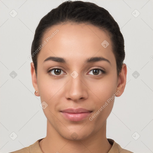 Joyful latino young-adult female with short  brown hair and brown eyes