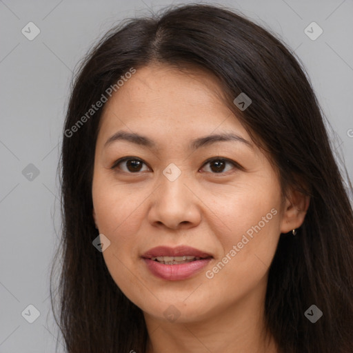 Joyful white young-adult female with long  brown hair and brown eyes