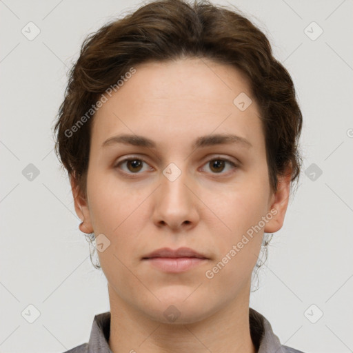 Neutral white young-adult female with short  brown hair and brown eyes