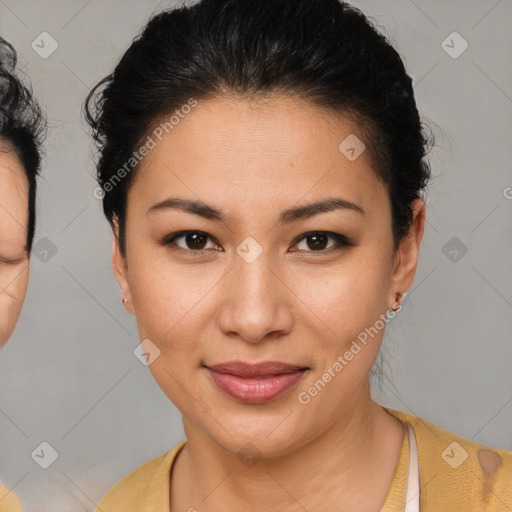 Joyful latino young-adult female with medium  brown hair and brown eyes