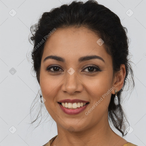 Joyful latino young-adult female with medium  brown hair and brown eyes