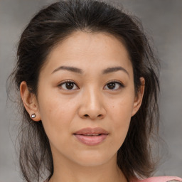 Joyful white young-adult female with medium  brown hair and brown eyes