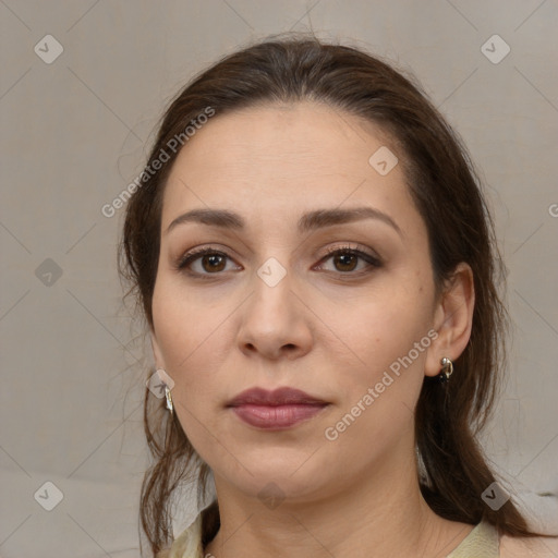 Neutral white young-adult female with medium  brown hair and brown eyes